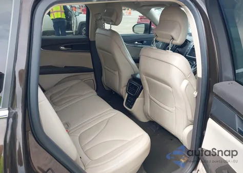 2019 Lincoln Nautilus Select z USA, uszkodzony, nr VIN 2LMPJ8K94KBL31395